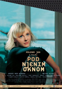 Plakat: Pod njenim oknom (2003). Na fotografiji: Polona Juh